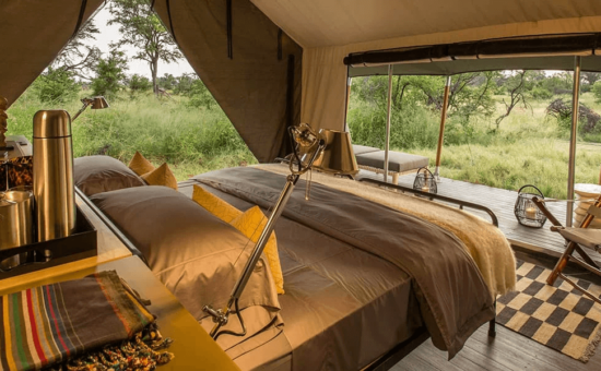 gomoti-plains-camp-rooms-luxury-tent-bedroom-01